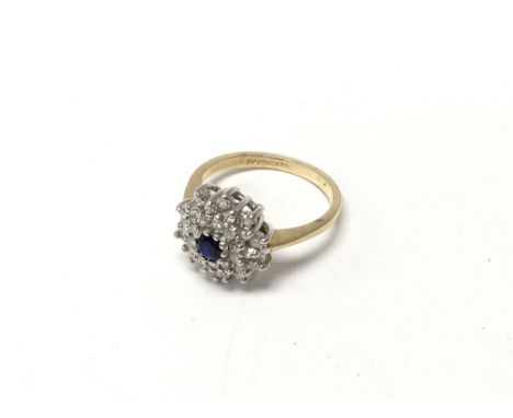 A 9ct gold sapphire and diamond cluster ring, size K ( A).