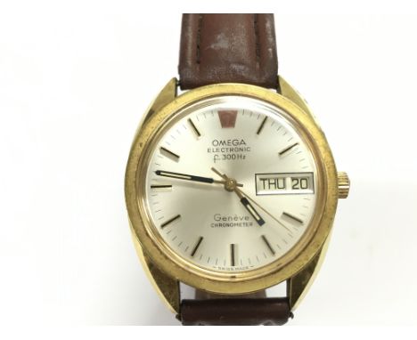 Omega Electronic Geneve chronometer day date with box and papers. Seen running. Circa 1970s Postage B