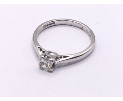 18ct white gold diamond solitaire princess cut ring. Approx 2.1g. Ring size J. Postage category A.