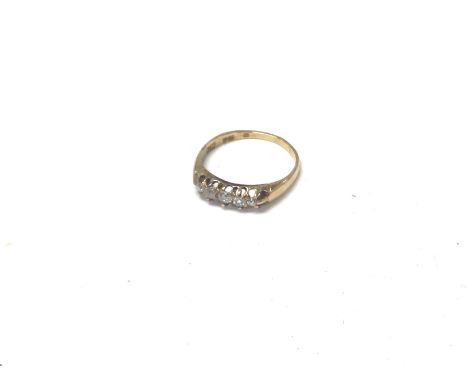 An 18ct gold ring set with a row of five old cut diamonds, approx 2.78 grams. Ring size P.