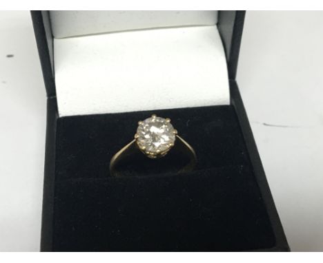 An 18carat gold ring set with a brilliant cut diamond approximately 1.5 carat and possibly colour J. Ring size L-M