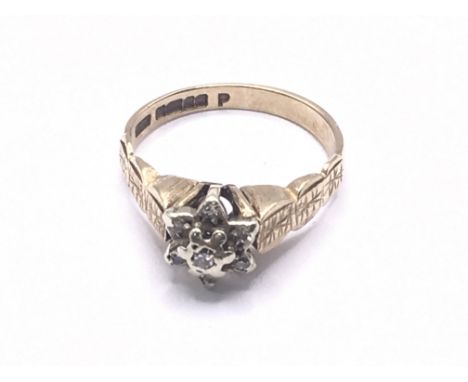 9ct gold diamond cluster ring. Approx 2.5g. Ring size K. Postage category A.