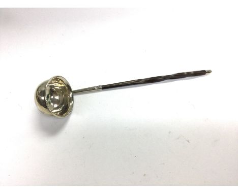A small Georgia silver tody ladle.