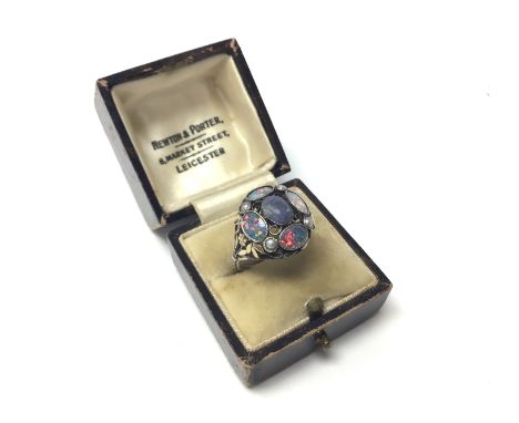 A silver and gold mounted opal and seed pearl ring, Size K, Postage category A. (Being sold for the horse refuge charity) sol