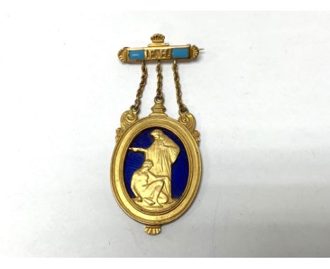 A 9ct gold and enamel pendant (A) 12.9.g