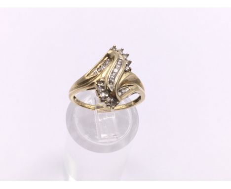 14ct gold diamond swirl cluster ring. Approx 3.2g. Ring size M. Postage category A.