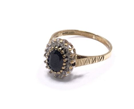 9ct gold diamond &amp; sapphire cluster ring. Approx 2.1g. Ring size L. Postage category A.