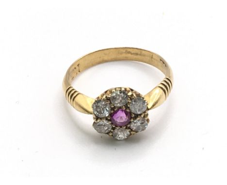 An 18ct gold ring set with ruby. Size M and 3.58g Postage B