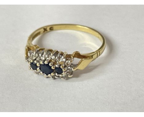 A 18ct gold ring inset with gem stone