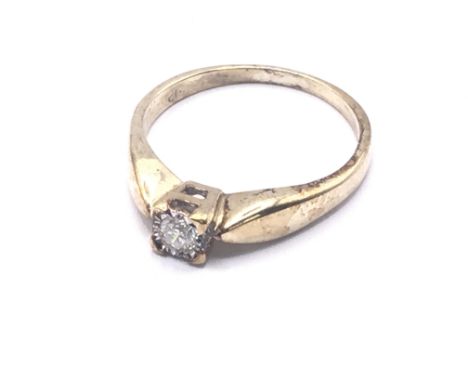 9ct gold diamond solitaire ring. Approx 2.3g. Ring size N. Postage category A.