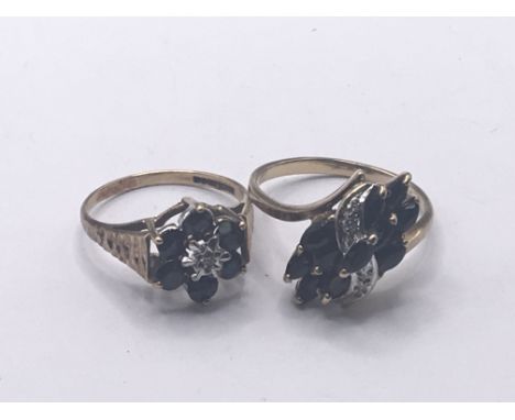 Two gold rings set with sapphire and small diamonds. ring size I and M total weight 4.5g