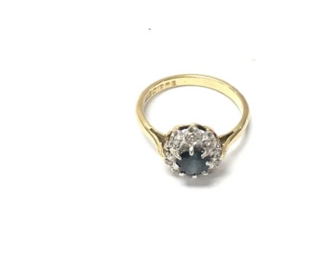 An 18ct gold sapphire and diamond ring size L1/2 and M. 3.34g Postage B