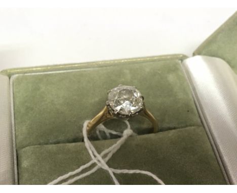 An 18carat gold solitaire diamond ring. The solitaire diamond approximately two carat or slightly larger the stone included. 