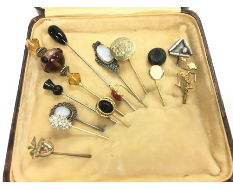 A collection of assorted stick pins. Postage B.