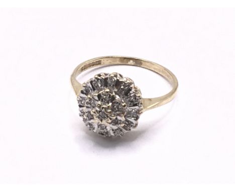 9ct gold diamond cluster ring. Approx 2.2g. Ring size K. Postage category A.