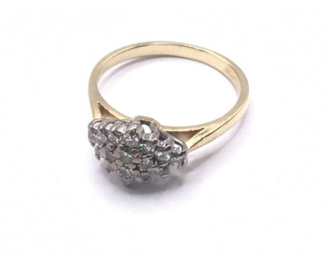 18ct gold diamond cluster ring. Approx 3g. Ring size K. Postage category A.