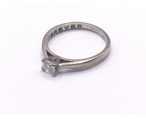 18ct white gold diamond solitaire. Approx 2.4g. Ring size J/K. Postage category A.