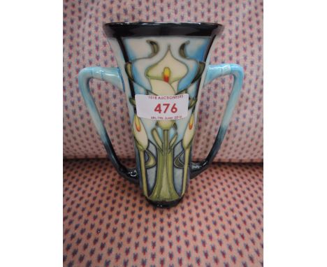 A Moorcroft vase of two handled design having stylised Art Nouveau pattern, dated 2001 