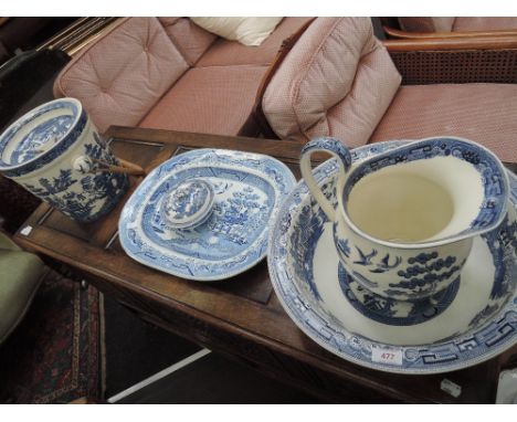 An early 20th century Wedgwood ewer and basin in the blue and white Willow pattern, a similar pail and meat platter etc