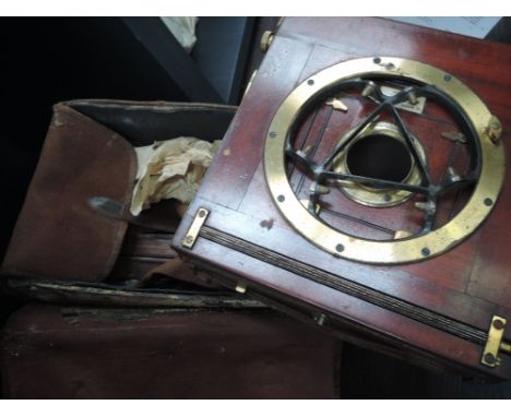 A late 19th/early 20th century Watson & Sons, London, mahogany case plate camera