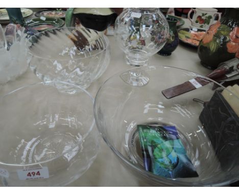 Three Dartington crystal bowls and a Dartington crystal candle lamp stand
