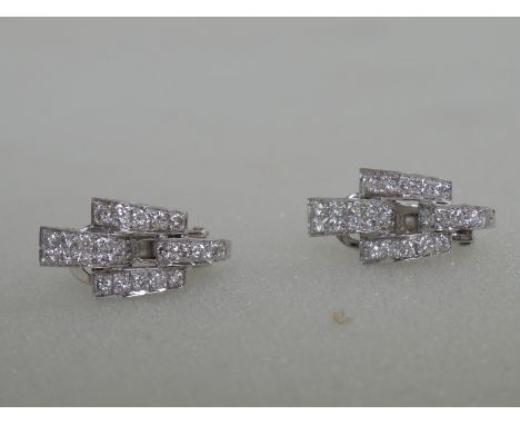 A pair of art deco style diamond clip earrings on HM silver mounts, London 1986