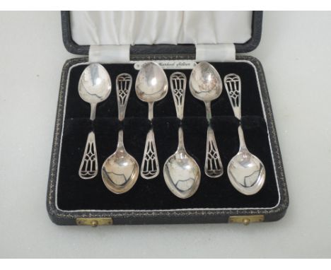 A cased set of silver tea spoons having pierced Art Nouveau style terminals, Birmingham 1924, Angora Silver Plate Co Ltd