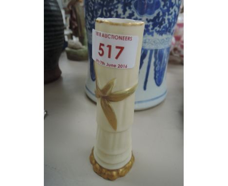 A Royal Worcester spill vase of gilt heightened Japanesque bamboo design number 1049