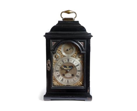 An ebonised bracket timepiece, the brass eight day single fusee movement, with a verge escapement, with a false pendulum and 