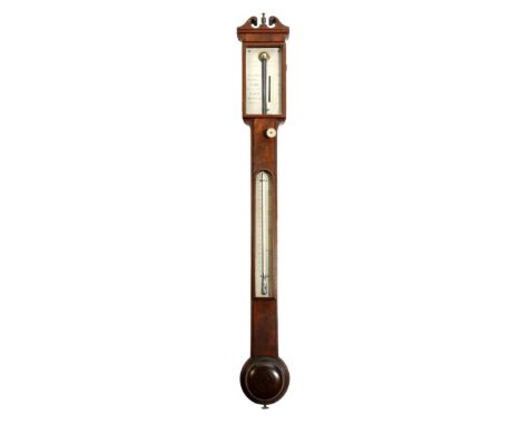 A George III mahogany stick barometer by James Long, with a broken arch swan neck pediment, with an urn finial above a silver