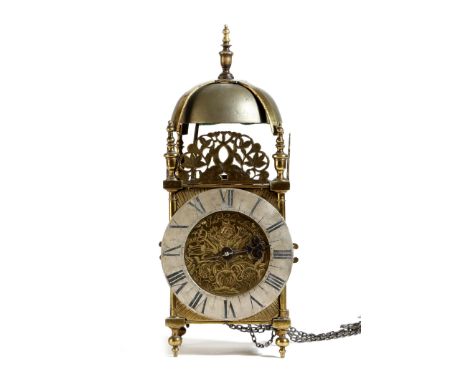 A William and Mary brass lantern clock by John London of Bristol, the posted movement, with an outside countwheel and strikin