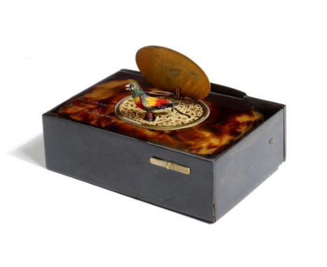 λ A Swiss tortoiseshell musical singing bird box, retailed by 'FINNIGANS, NEW BOND ST. W.' the top with an engraved gilt bras