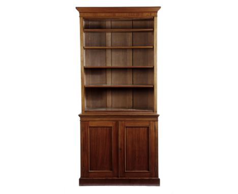 A Victorian mahogany bookcase cabinet, with four adjustable shelves, above a pair of panelled doors, enclosing a shelf, 226cm