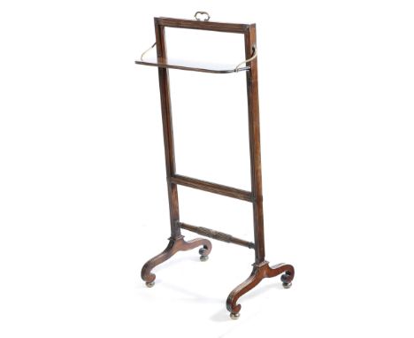 λ A George IV rosewood firescreen in the manner of Gillows, with an adjustable glazed panel, with a brass foliage handle and 