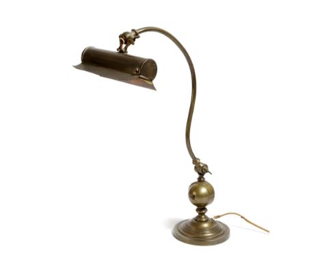 A brass adjustable desk lamp, 47cm high.