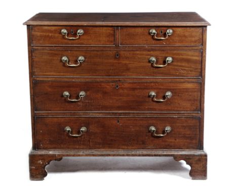 A George III mahogany chest, with two short and three long drawers, on shaped bracket feet, 92cm high, 102.3cm wide, 57.7cm d