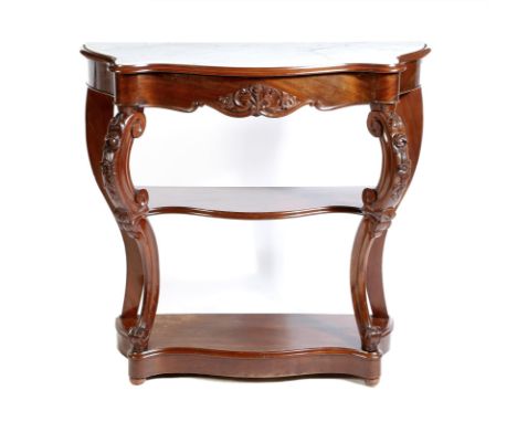 A 19th century mahogany serpentine console table, with a white marble top, above a frieze drawer, with flower carved double s