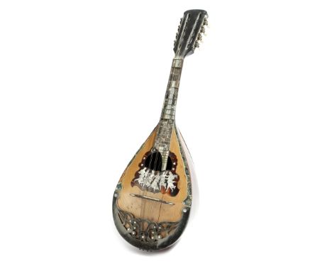 λ A 19th century Italian Neapolitan rosewood mandolin, inlaid with mother of pearl, tortoiseshell and abalone and decorated w