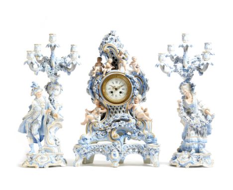 A late 19th century German Dresden porcelain clock garniture, the brass eight day drum movement stamped '180248', striking th