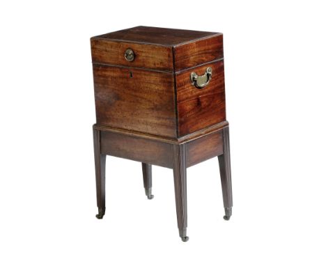 A George III padouk cellaret, the hinged top with a caddy moulded edge, above a later baize lined vacant interior, with brass