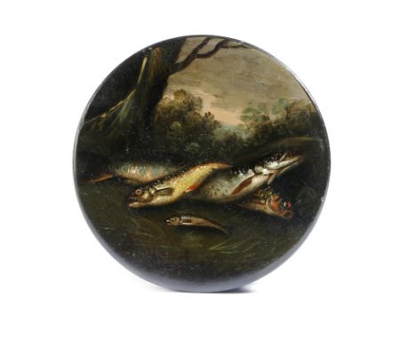 A 19th century lacquered papier-mâché snuff box, of circular form, the lid painted with fish on a riverbank in the manner of 