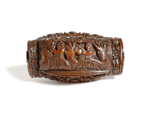 An early 19th century French carved coquilla nut snuff box, the hinged lid carved with two female missionaries, one holding a
