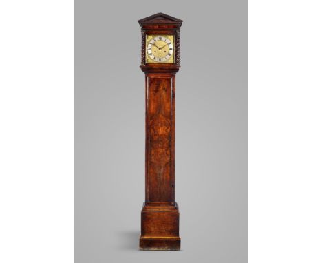 A fine William and Mary walnut longcase clock by William Clement, the brass movement of one month duration with five latched 