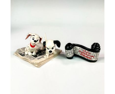 Ceramic figurine and opening title in matte finish modeled as two dalmatian puppies seated on the weekly newspaper. Walt Disn