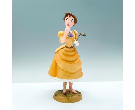 A porcelain figure of Jane Porter from Disney's Tarzan holding a soup ladle and pointing to her mouth. Walt Disney Classics C