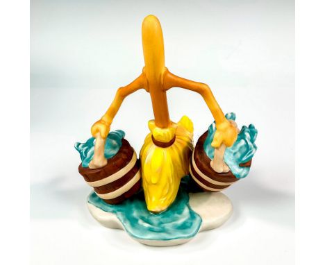 Ceramic in matte finish modeled as a figural mop carrying two buckets of water. Walt Disney Collection backstamp. This item h