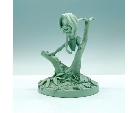 A figure depicting Young Tarzan from Disney's Tarzan that depicts him balancing on a tree by splitting his legs along the bra