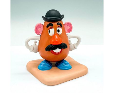 Porcelain figure with matte finish. Depicts the wisecracking spud from the 1995 computer-animated film franchise, Toy Story. 