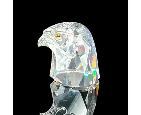 Part of the 'Endangered Species' collection. Clear facetted with amber-blue eyes. Swarovski etched marking on the side. This 