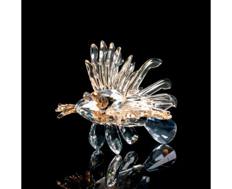 Lead crystal part of the South Sea series and is made with light salmon colored fins. Swarovski etched backstamp. This item h